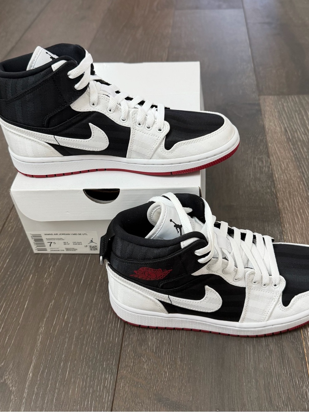 NWT Nike Women’s Air Jordans Mid High-Top Sneakers - Black/White with Red Soles